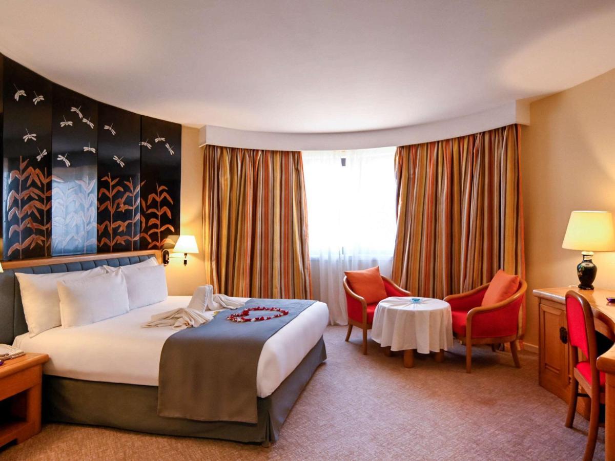 Hotel Mercure Alger Aeroport Maison Blanche Exterior photo A room at the hotel