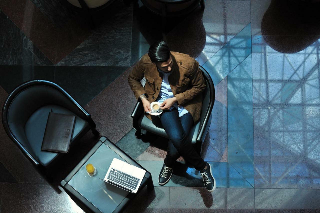 Hotel Mercure Alger Aeroport Maison Blanche Exterior photo A student studying at the library